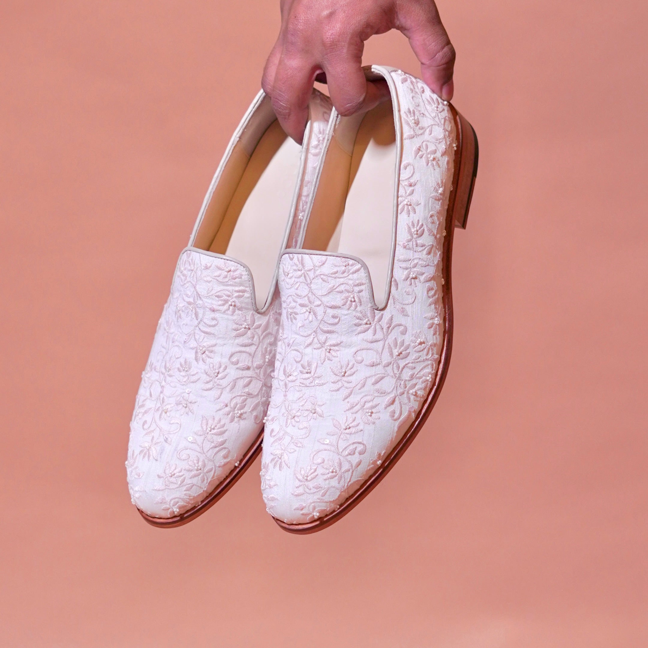 Ricamo Avorio ivory silk embroidered loafer for men – held in hand, top view