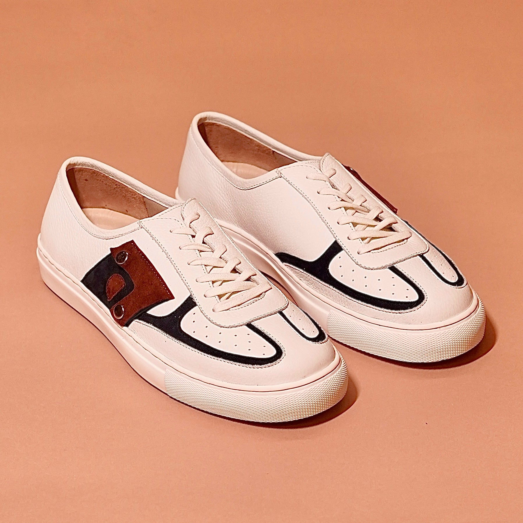 Bianco Azzuro sneaker with side pocket detail and black leather paneling