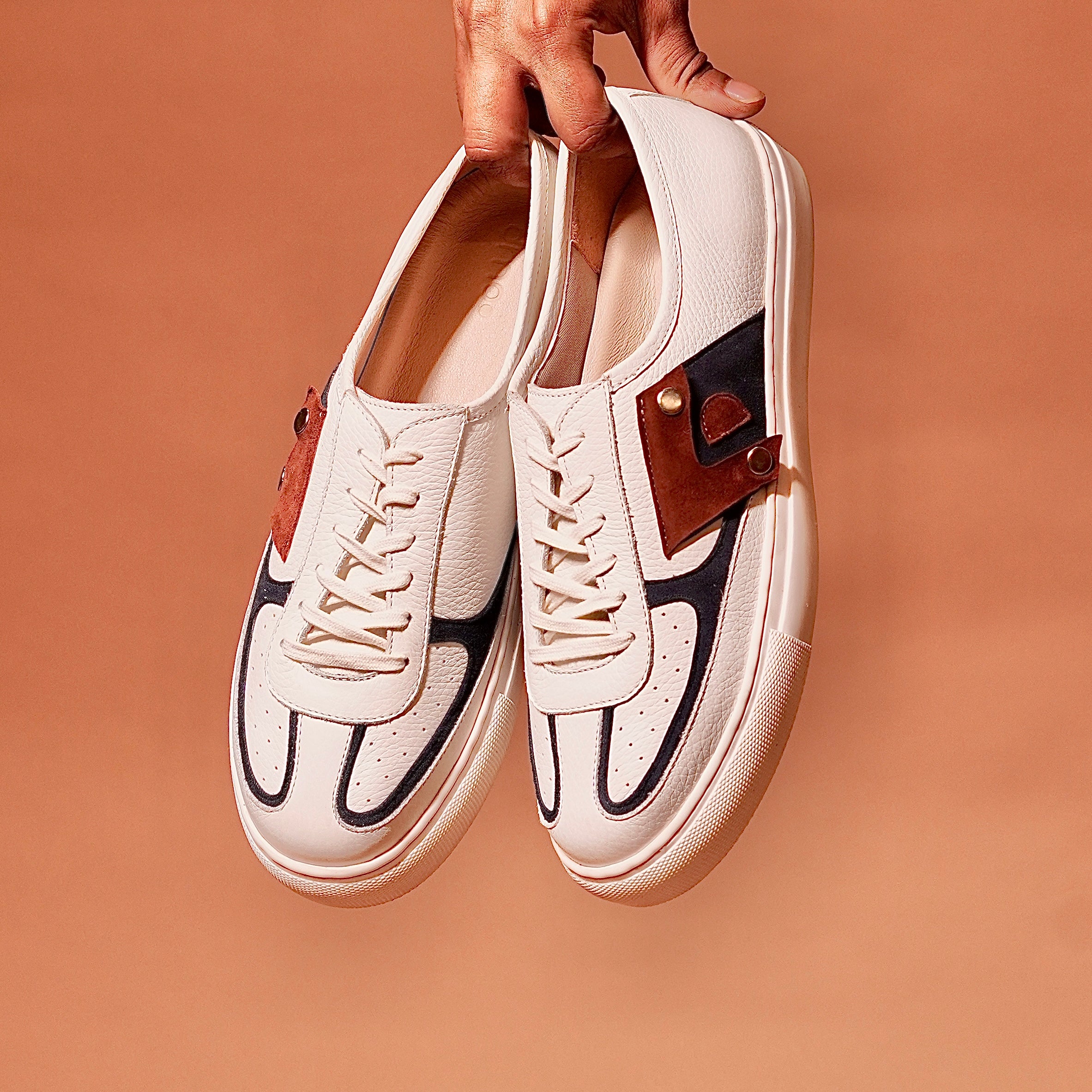 Top view of Bianco Azzuro cream sneaker with laces and accent stitching