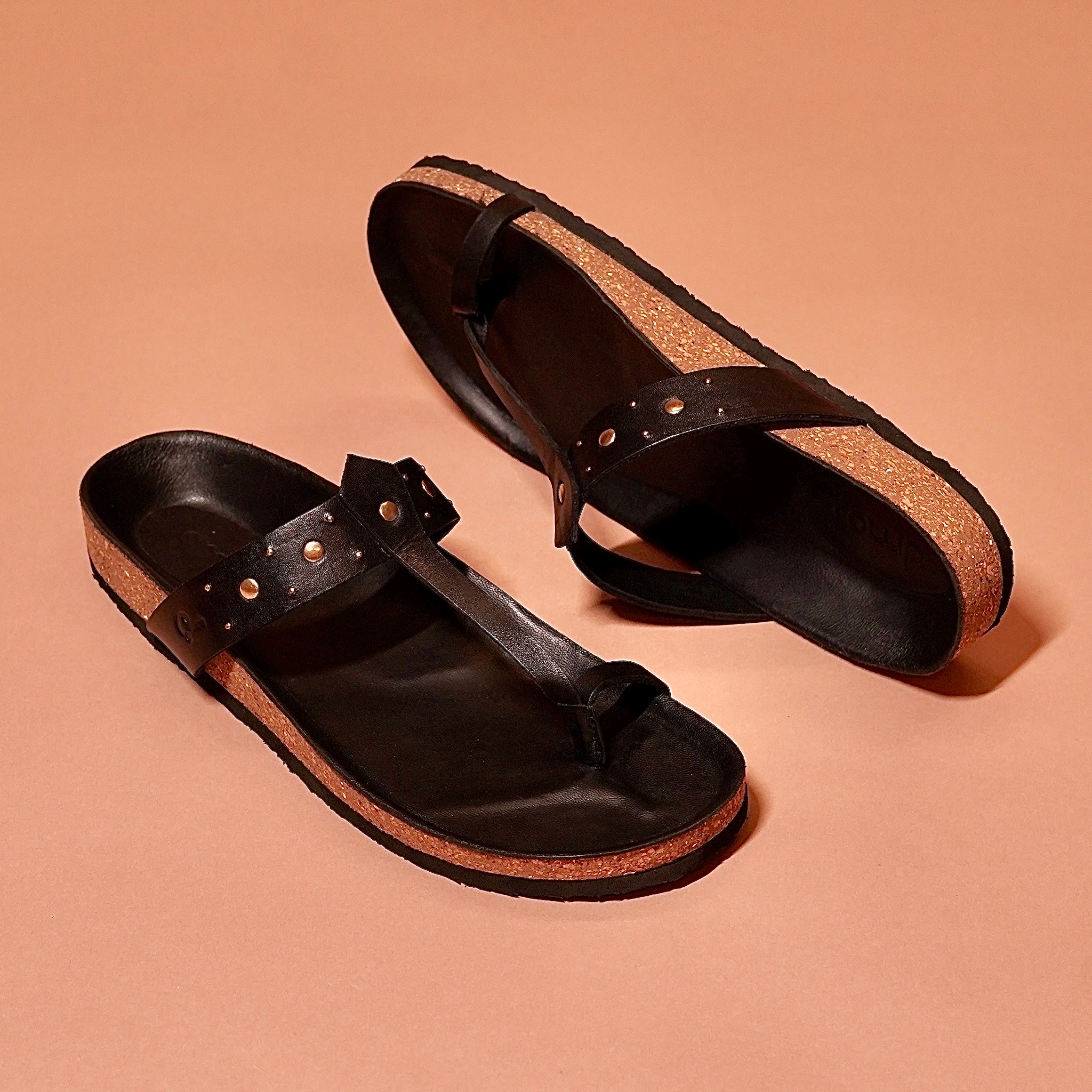 Top view of Pelle Corko Riveto showing rivet detail and toe loop