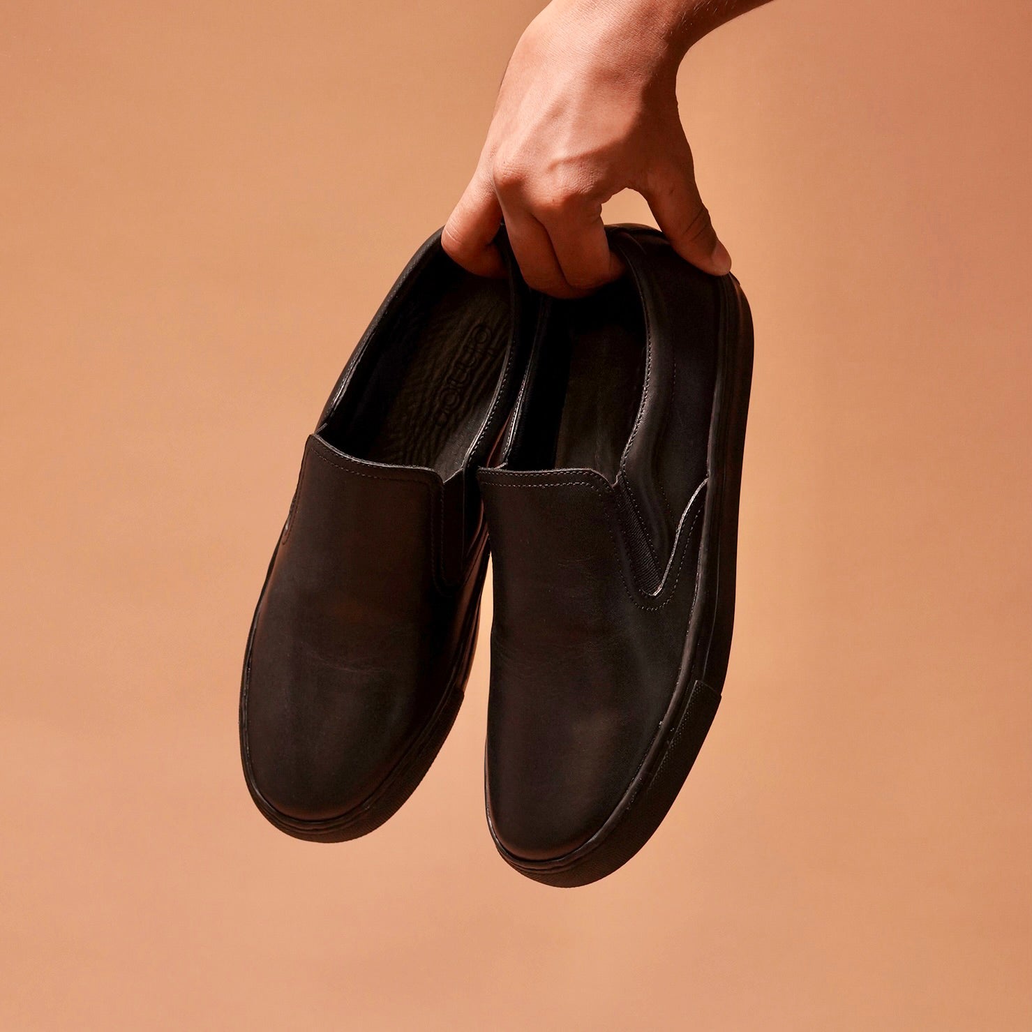 Front view of Scarpo Nero highlighting the classic design and vintage vibe.