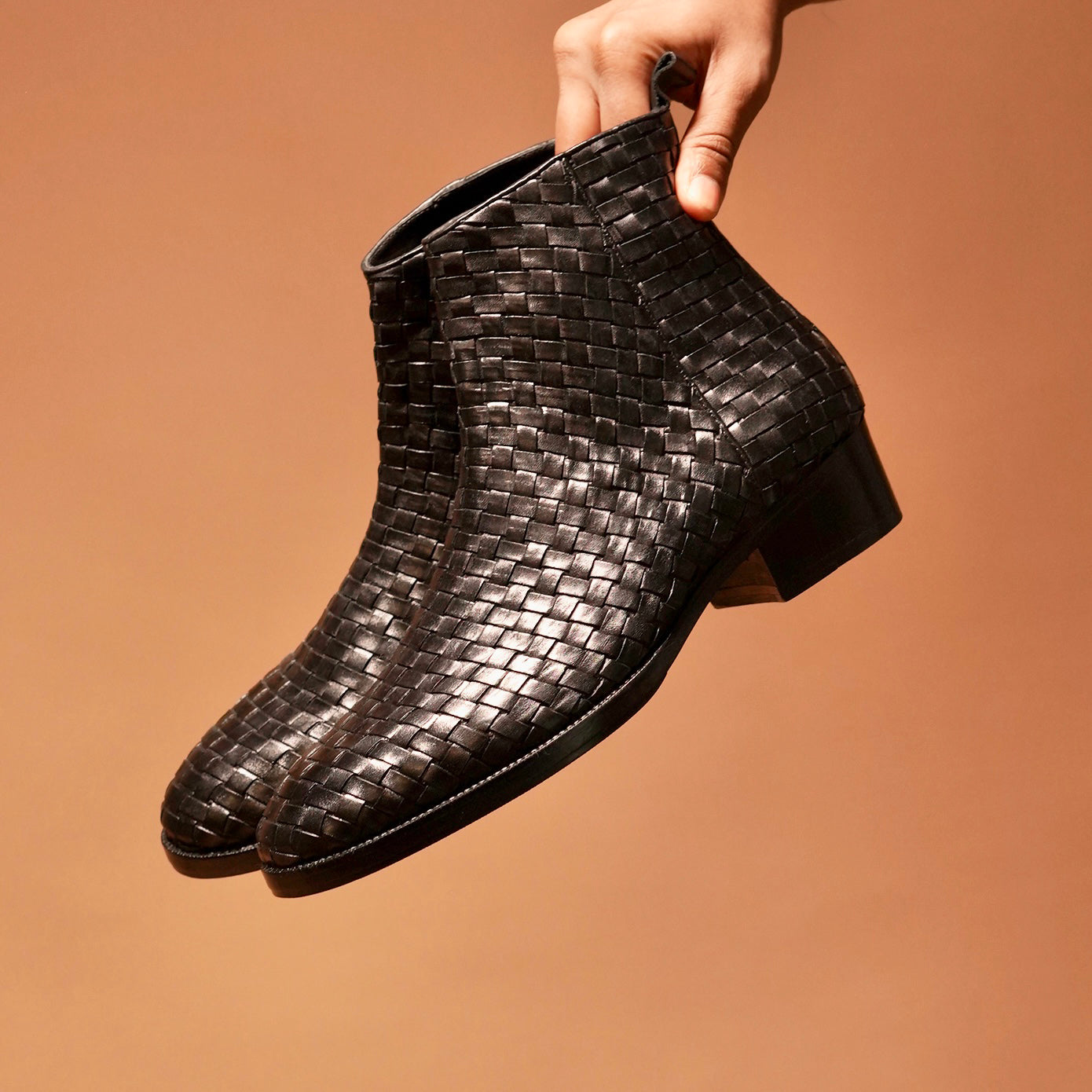 Sprazzo Tesso Nero paired with stylish outfits for a standout look.