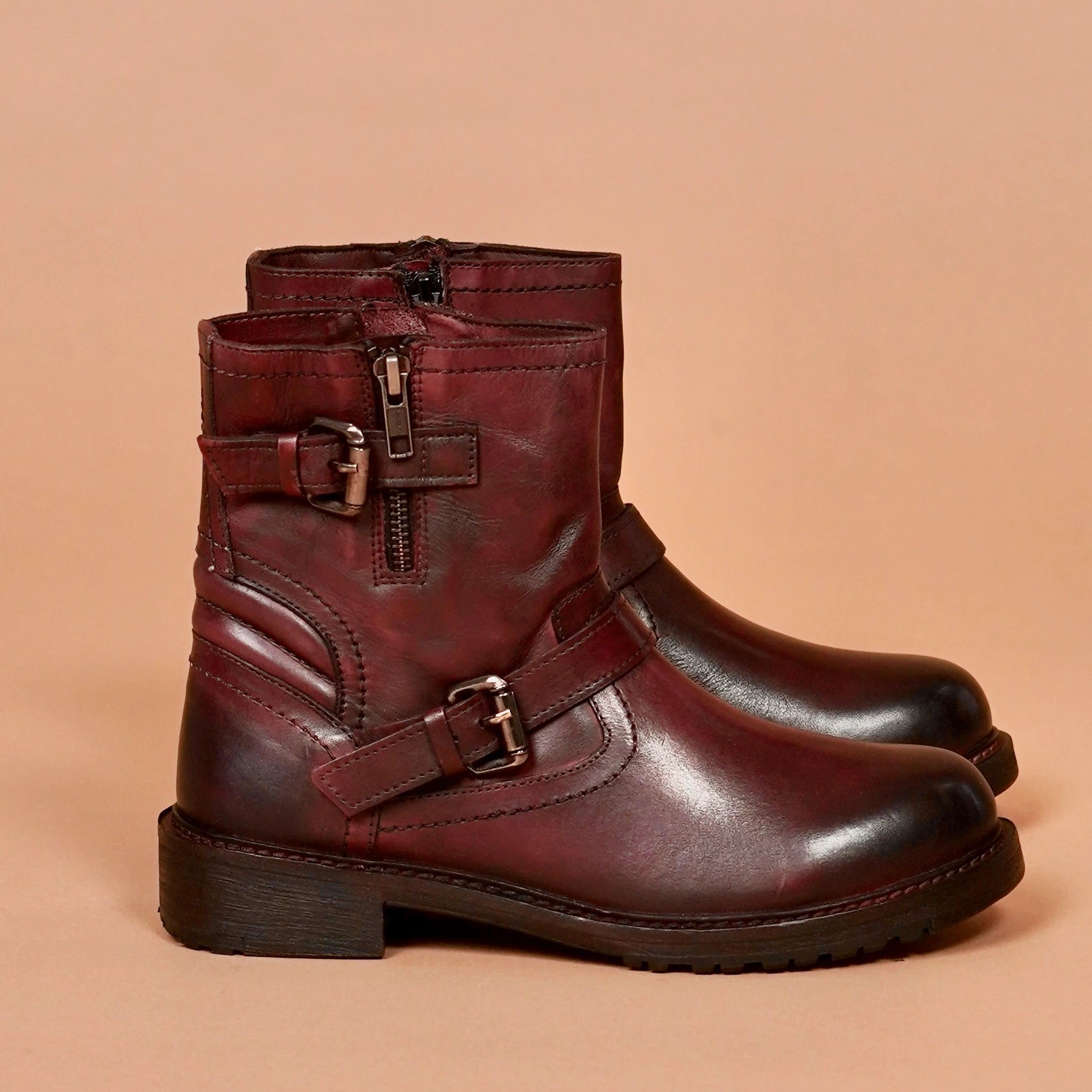 Women's leather ankle boots with buckle and zip