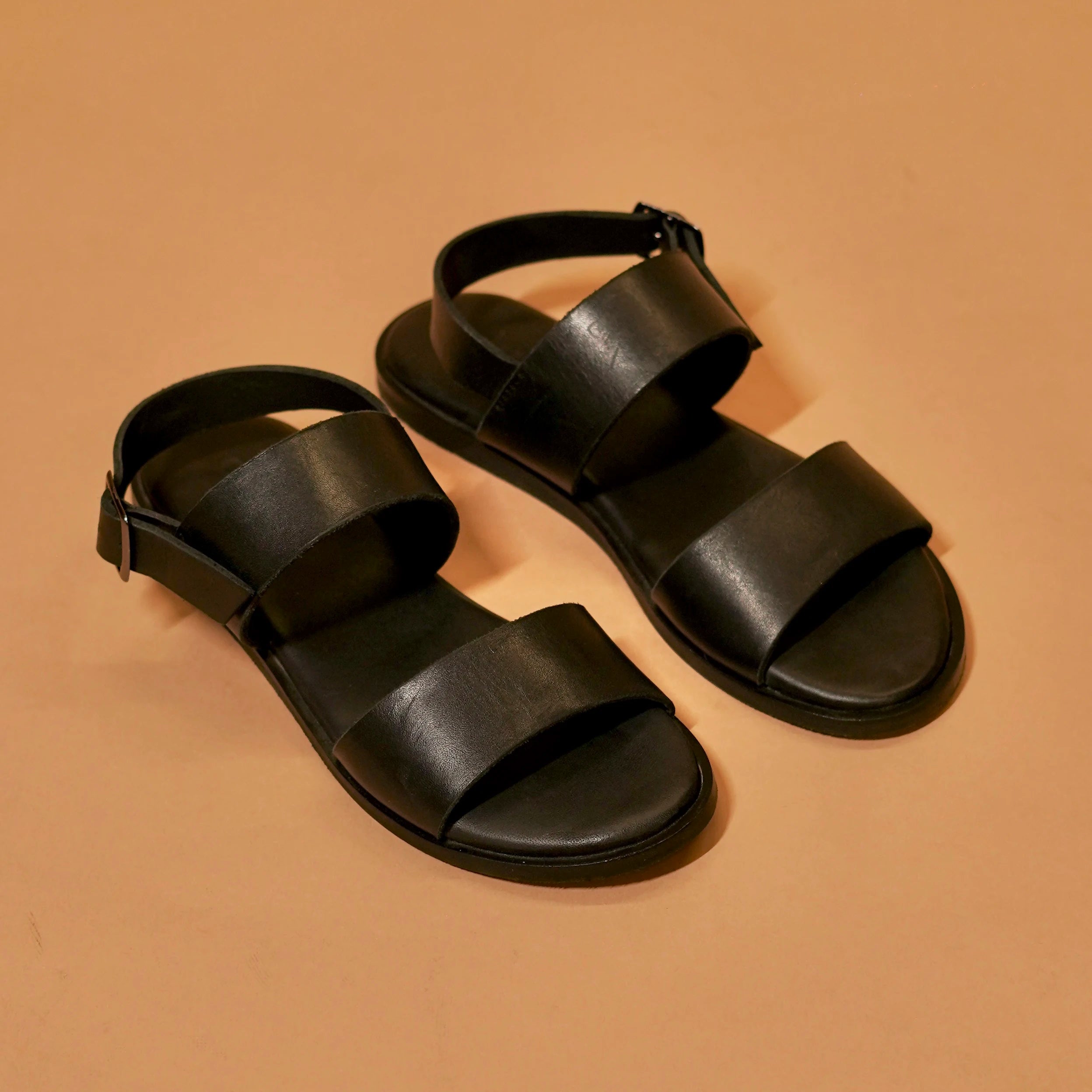 Black strap sandal with backstrap