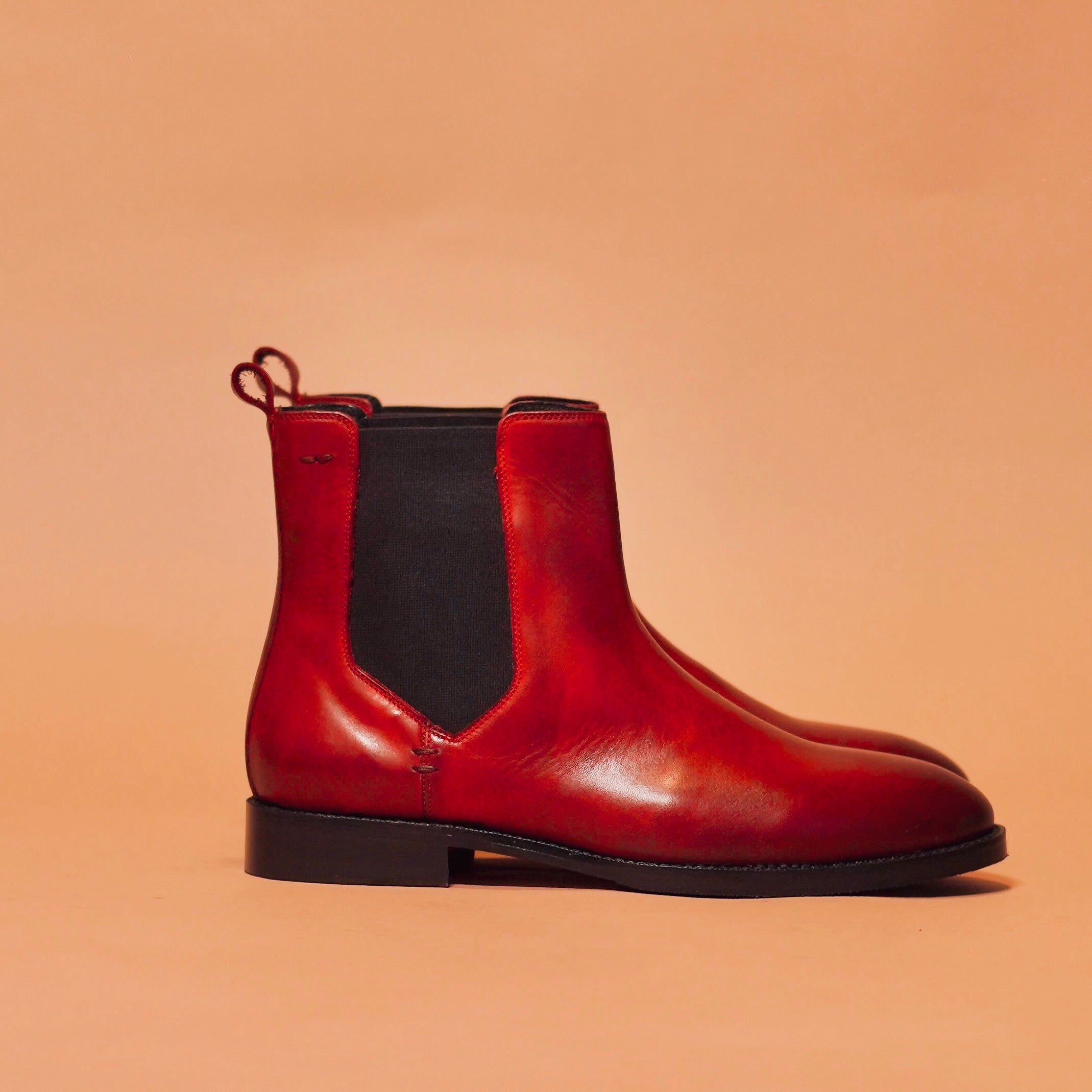 Side angle of Sprazo Bordo Chelsea boot showing burnish details