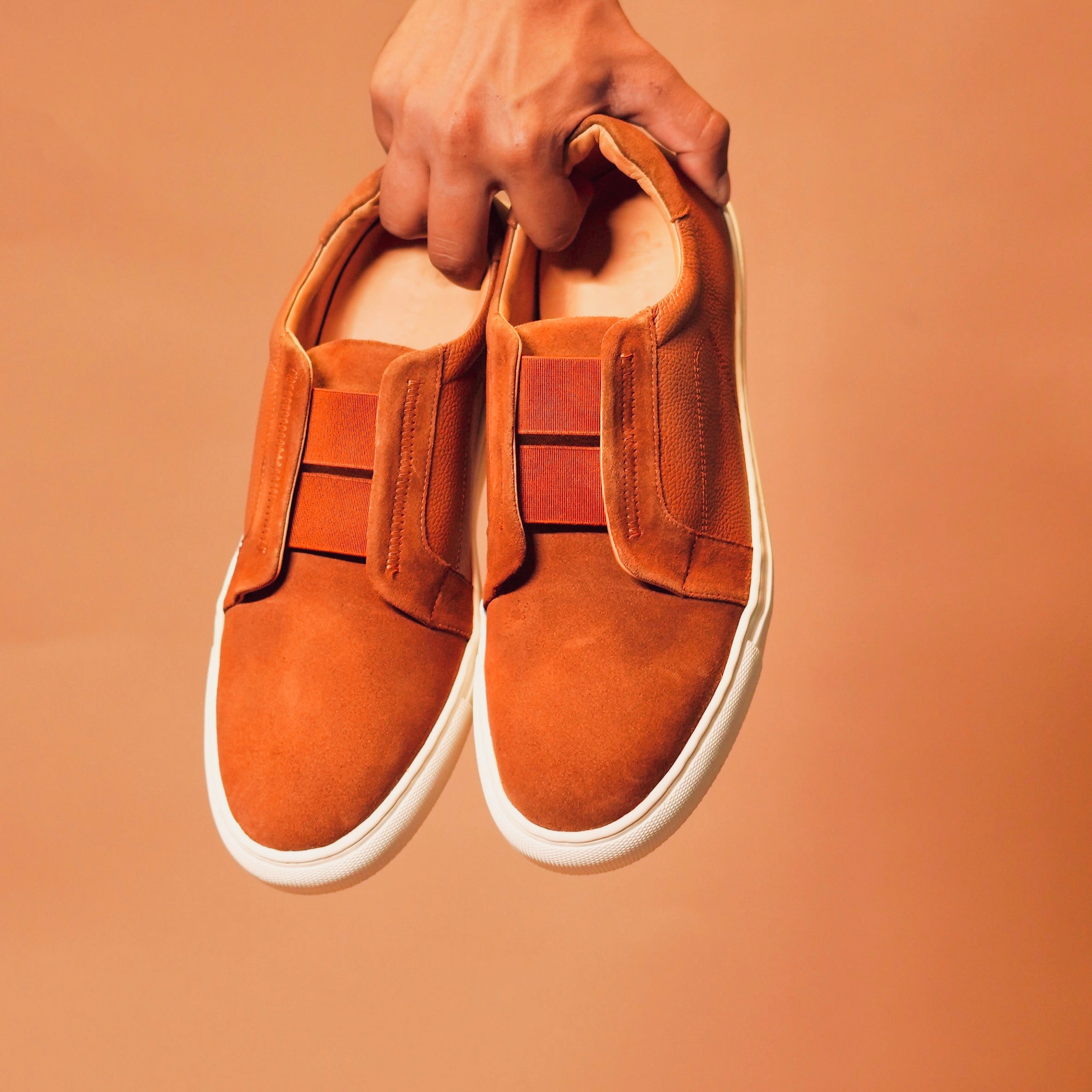 Top view of Scarpo Tobacco sneaker illustrating the color and design