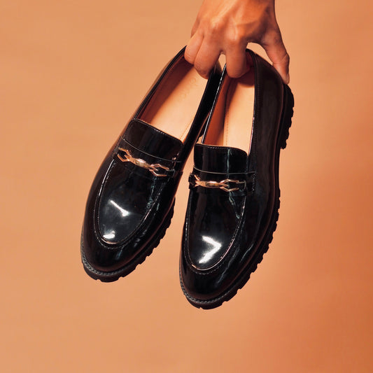 Close-up of Moccasino Nero patent leather texture