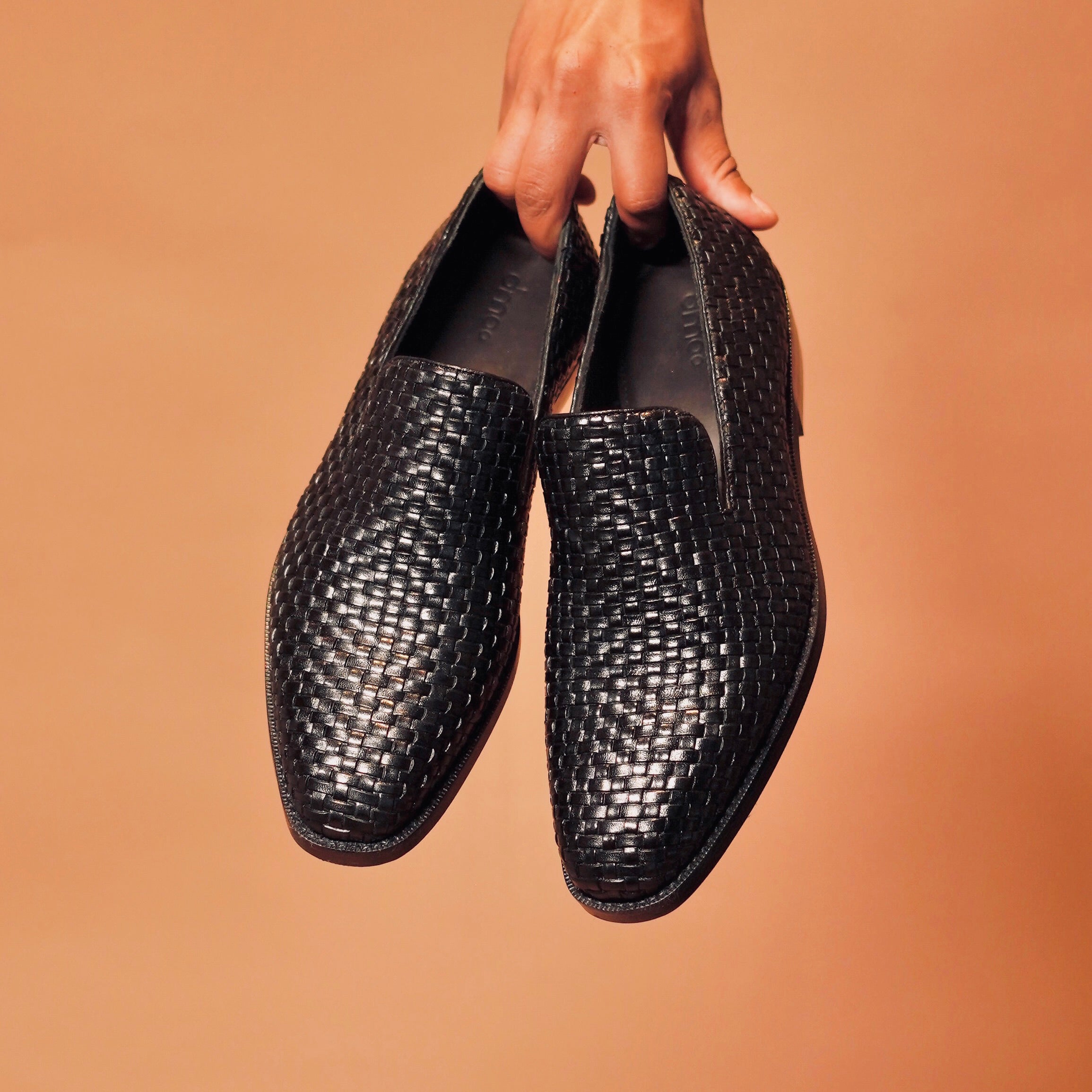 Front view of Cubano Tesso Nero highlighting the loafer's sleek design