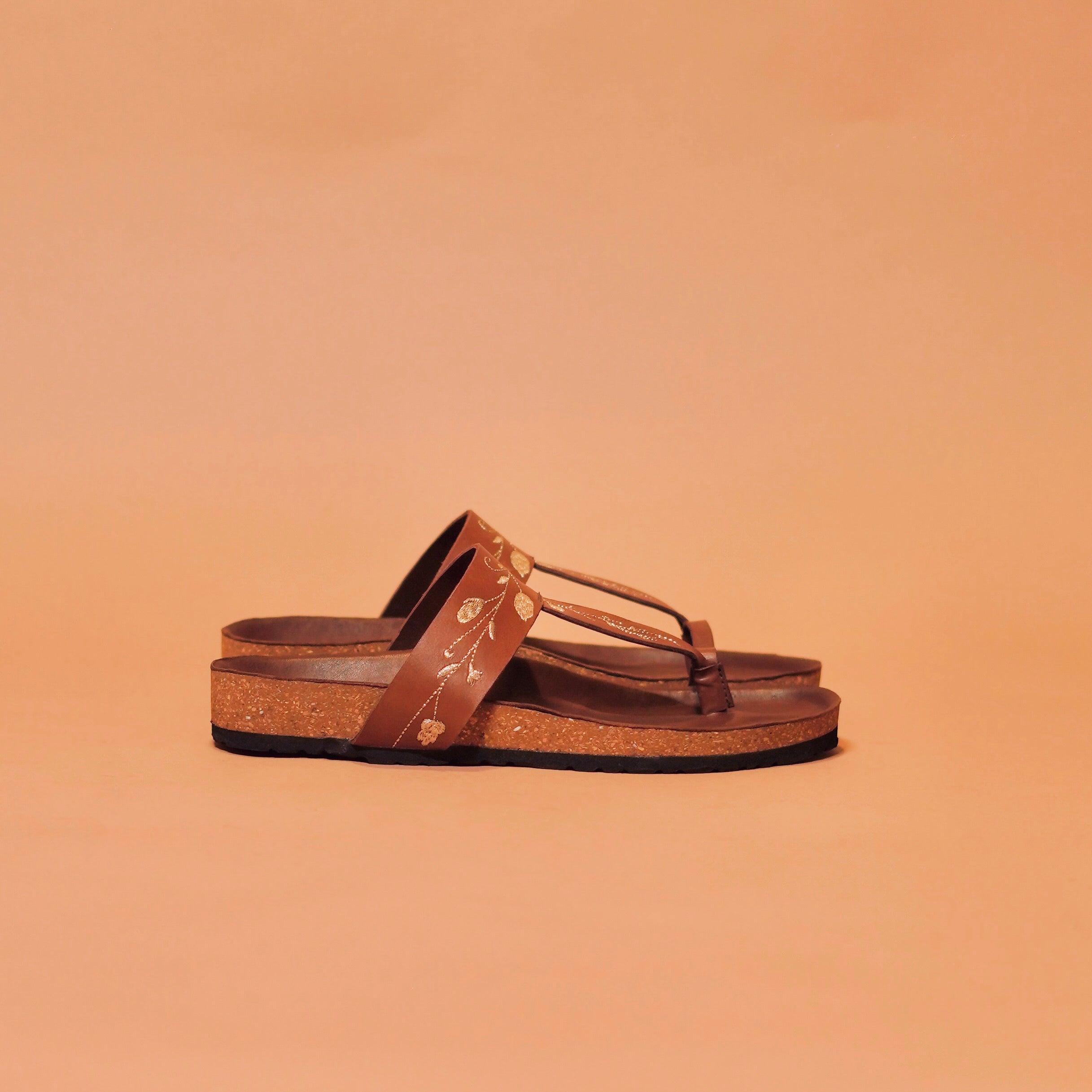 Side view of Bruno Corko Ricamo showcasing the hand-embroidered petals