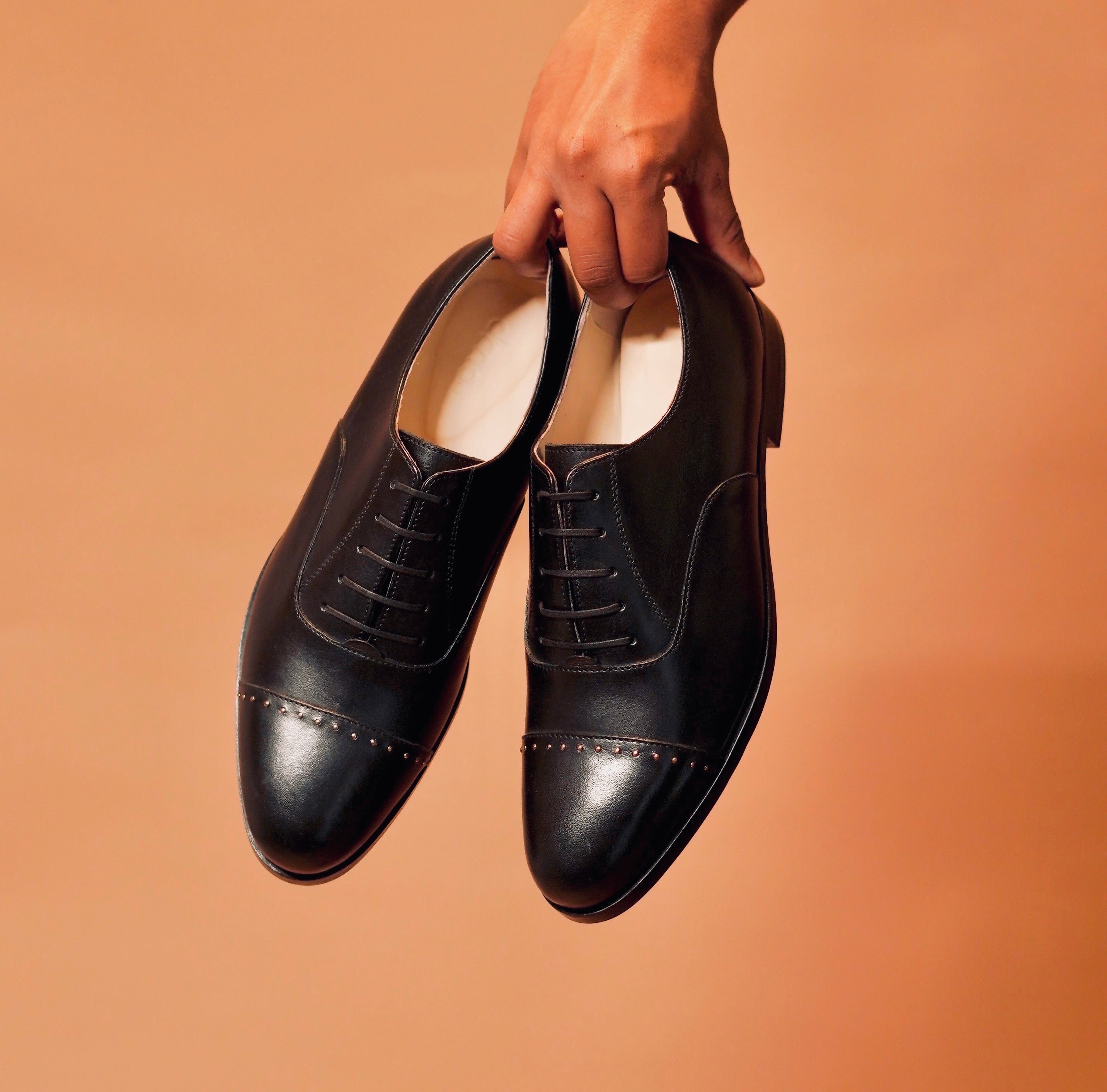 Detailed shot of the anti-skid leather sole on Capto Nero Riveto