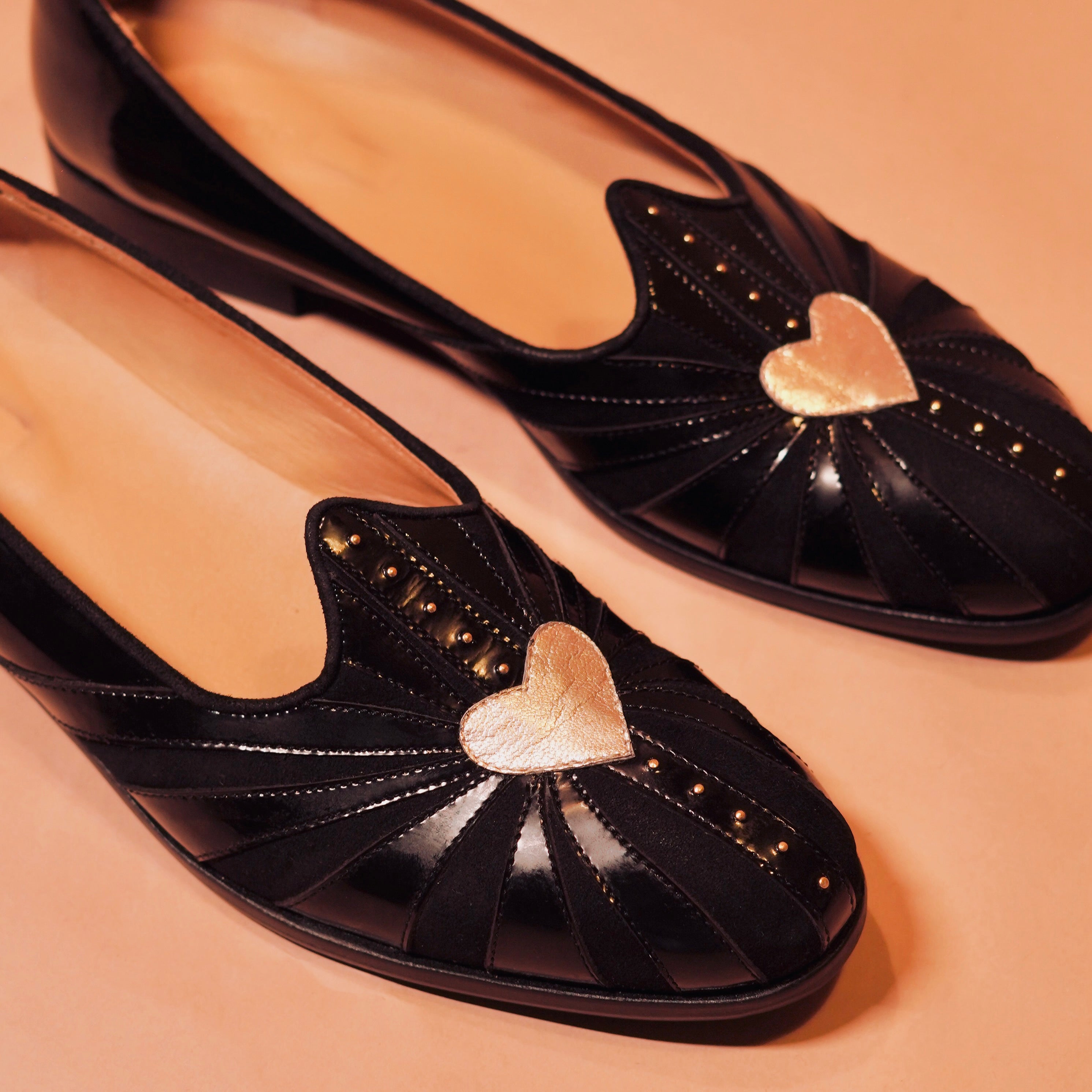 Close-up of Ethnico Cuoro’s patent leather and suede combination