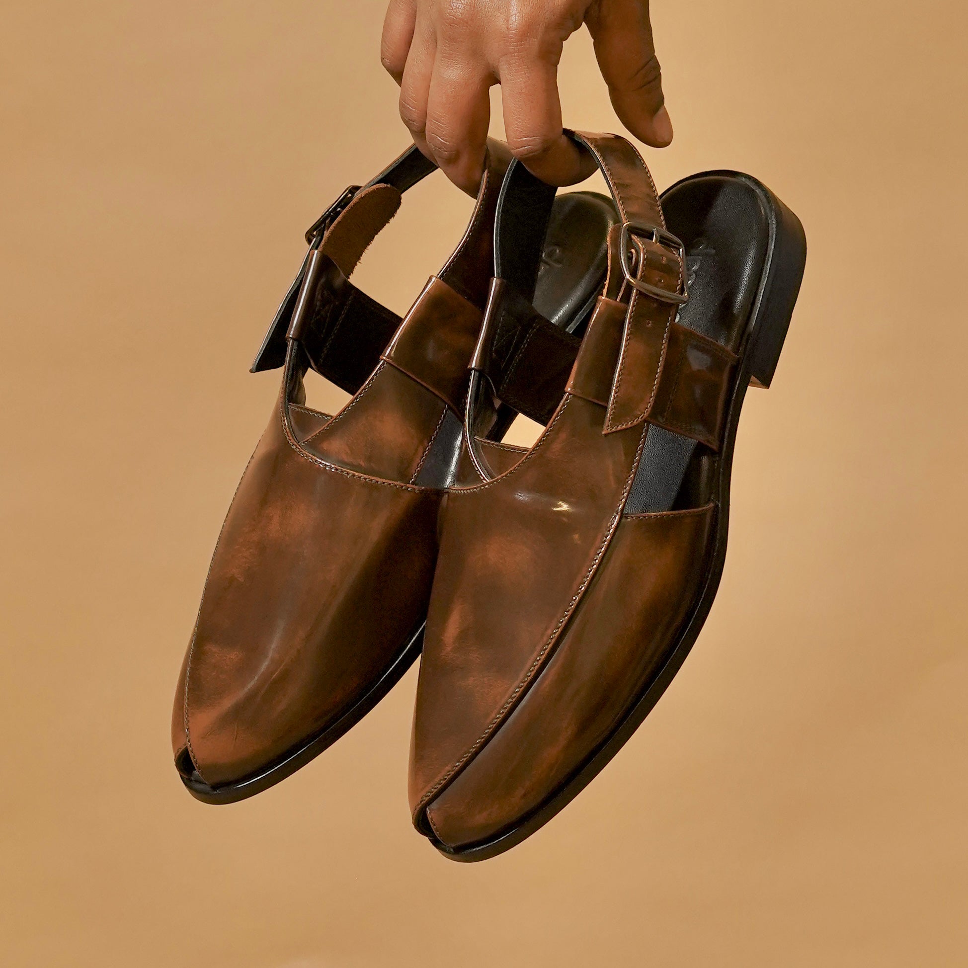 Top view of leather sandal with buckle closure