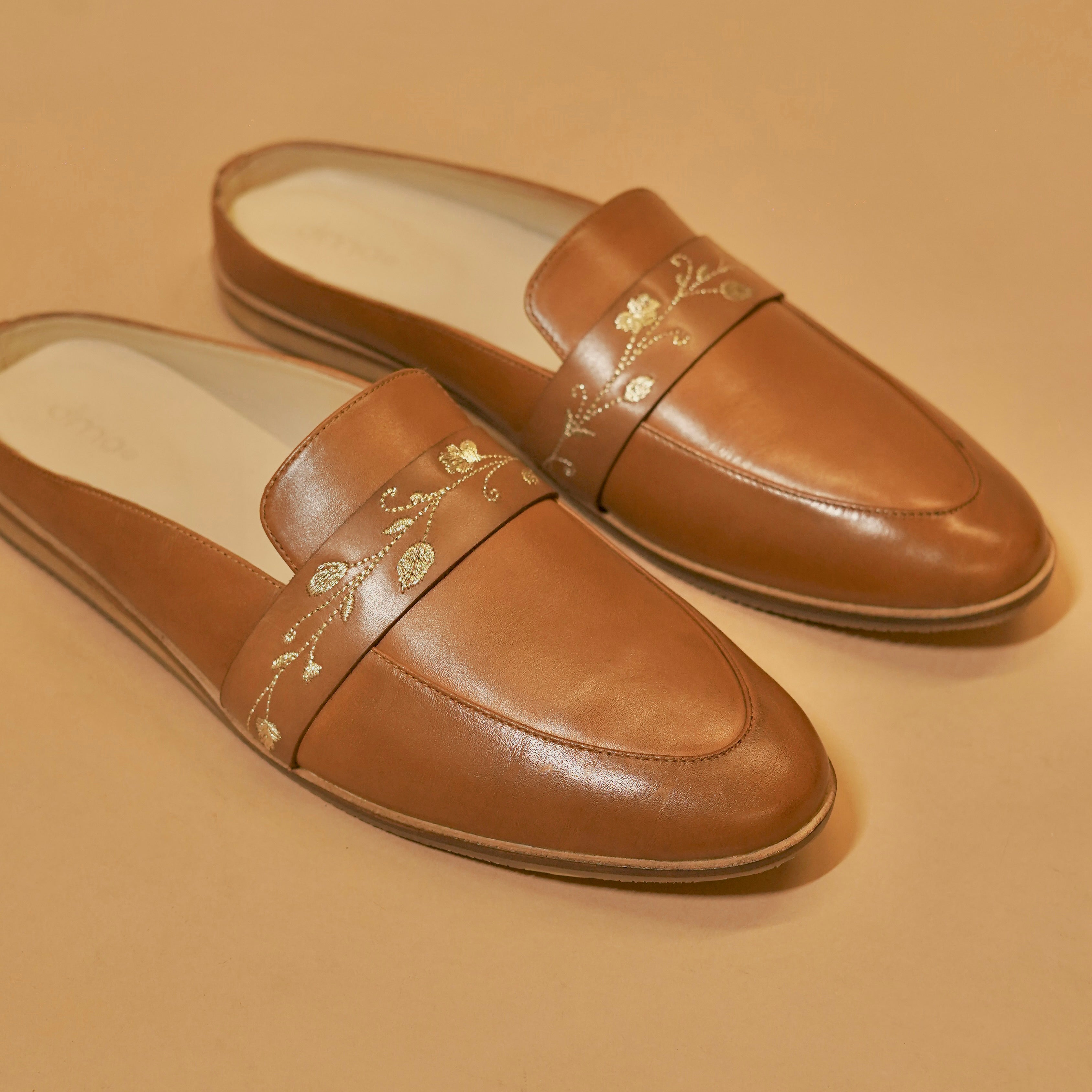 Close-up of embroidery and leather texture