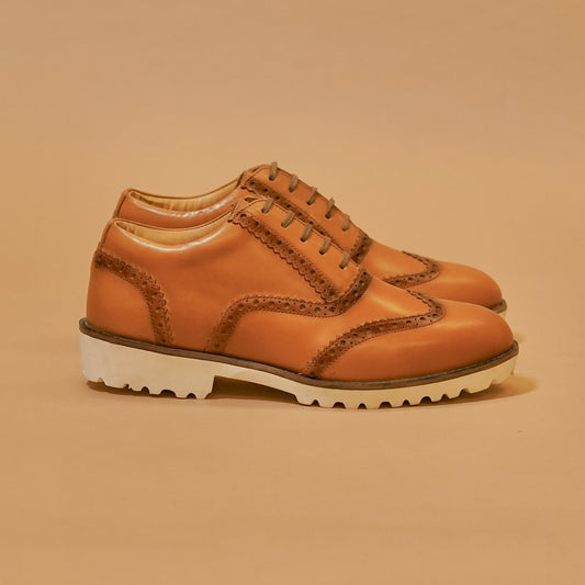 Side profile of Cuoio brogue shoes