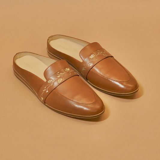 Tan embroidered leather mules for men