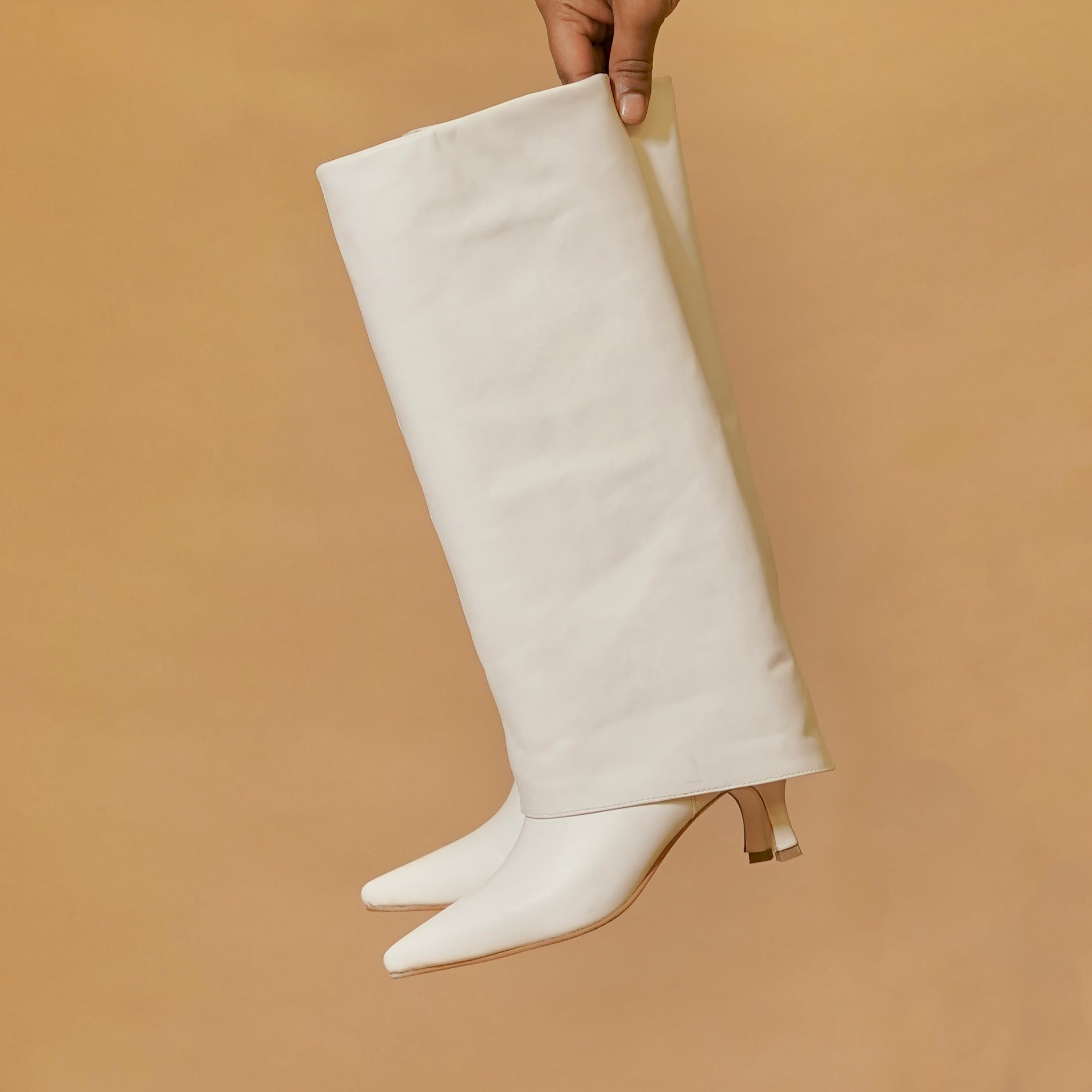 Close-up of smooth leather and kitten heel