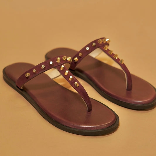 Close-up of suede and rivet detailing