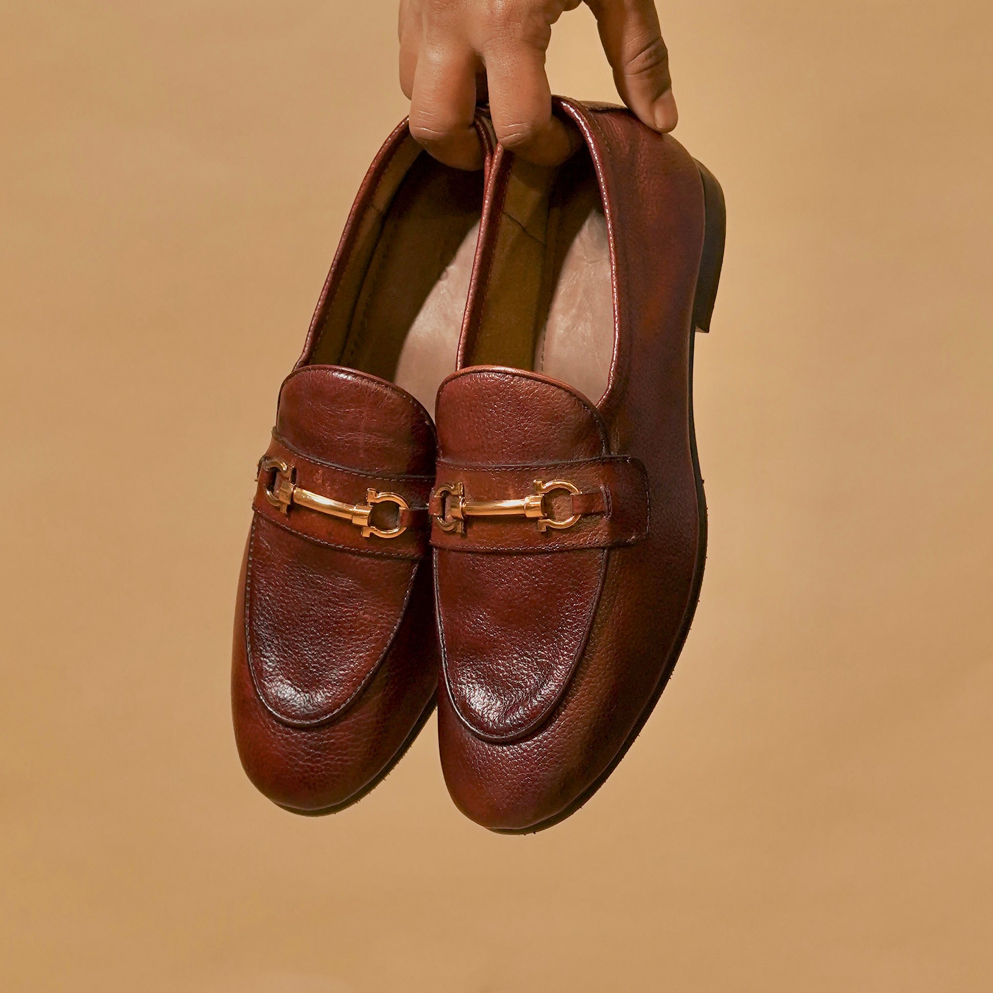 Three-quarter view of men’s horsebit loafers