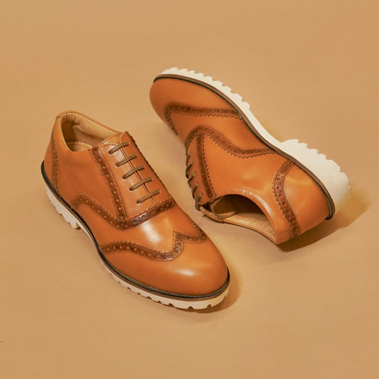 Three-quarter view of women’s lace-up brogues