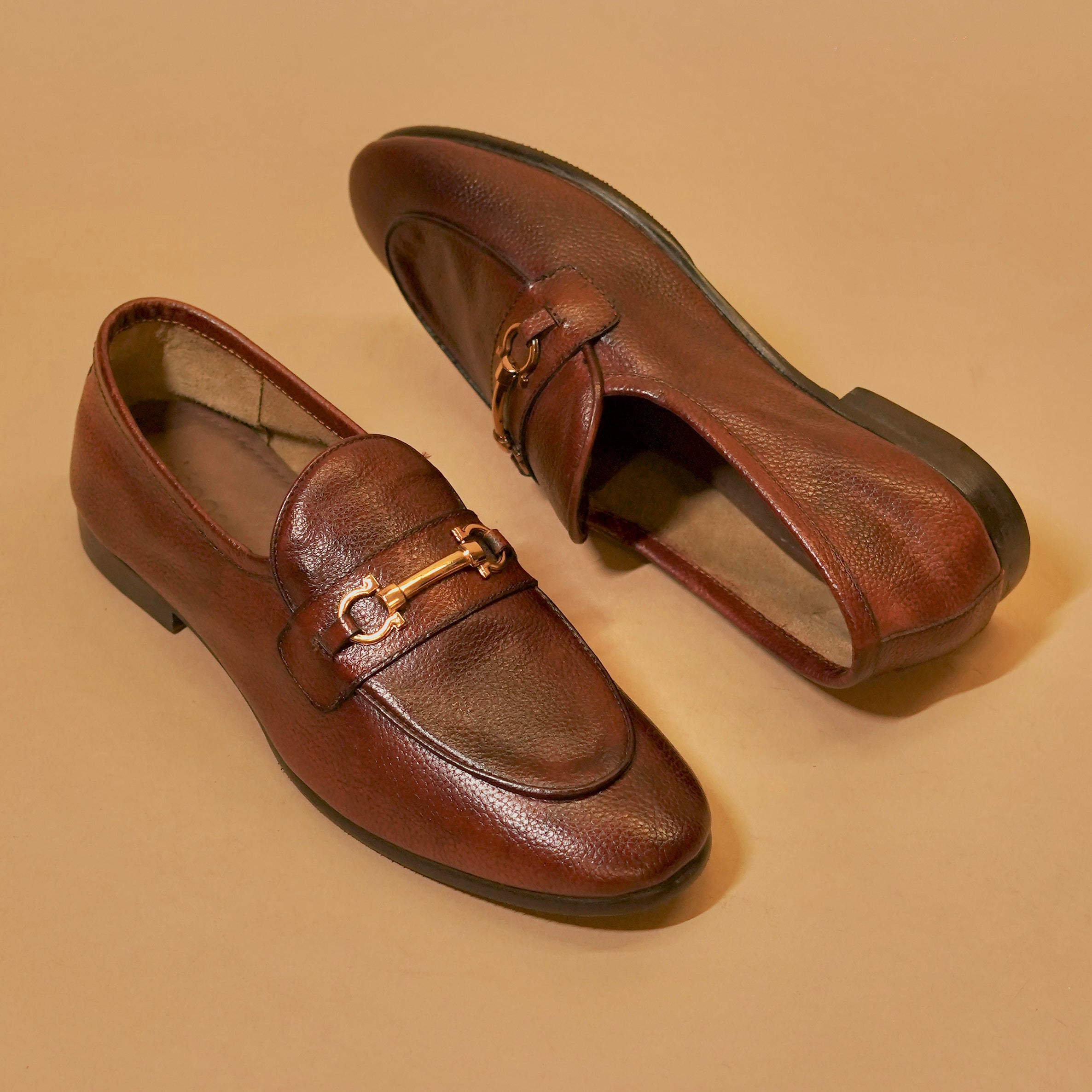 Close-up of golden horsebit detail