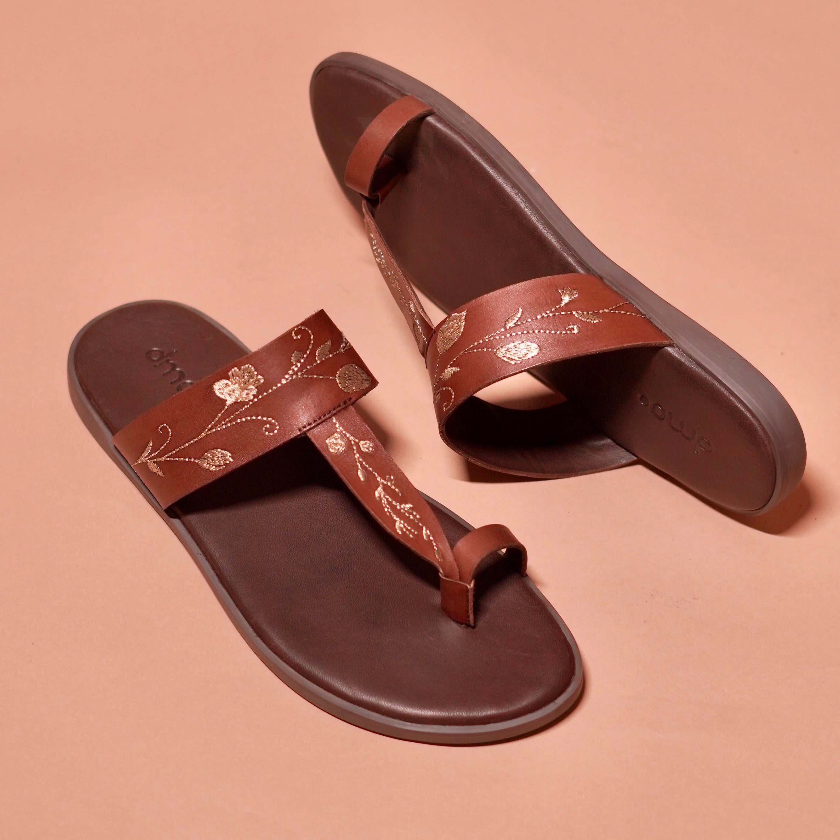 Top view of Pelle Chocro Ricamo styled with linen pants