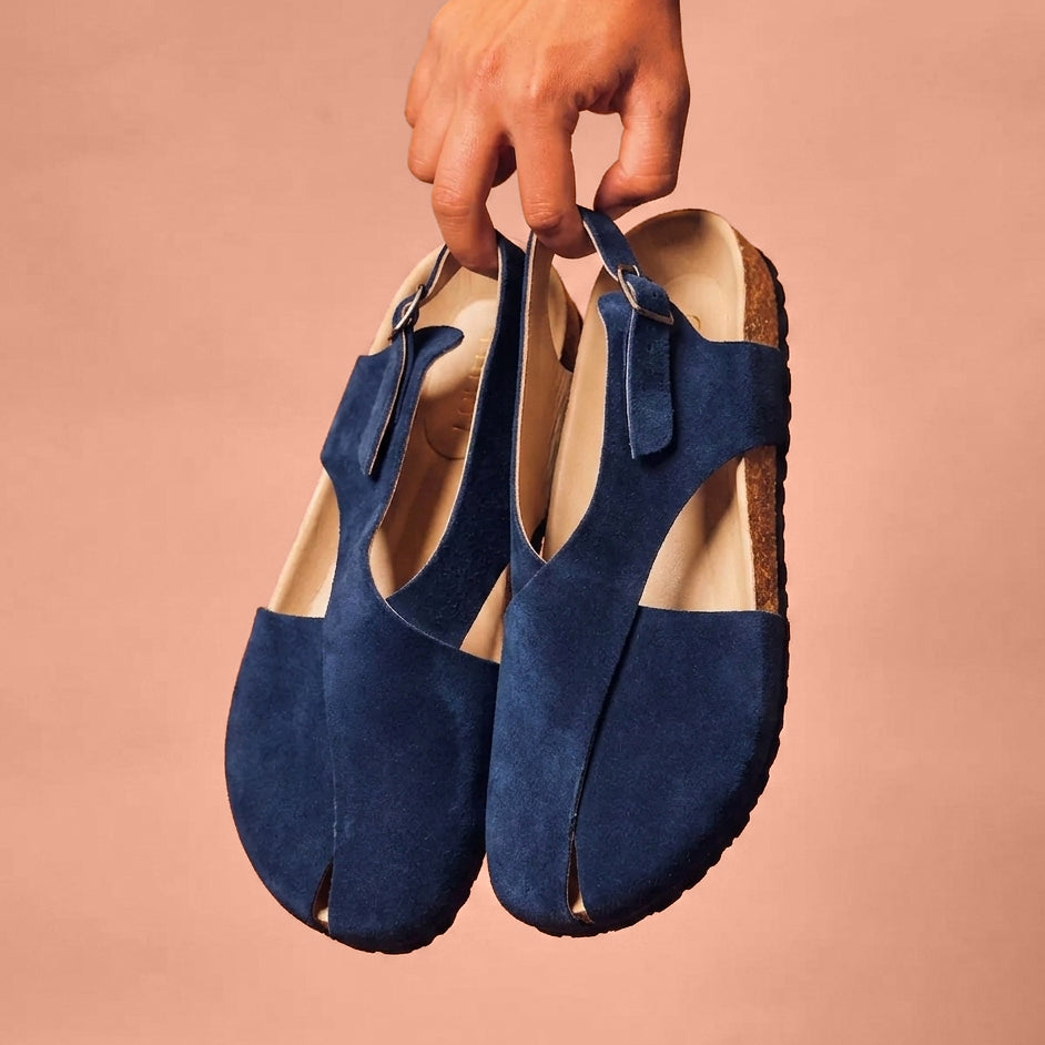Navy suede sandal with beige leather footbed